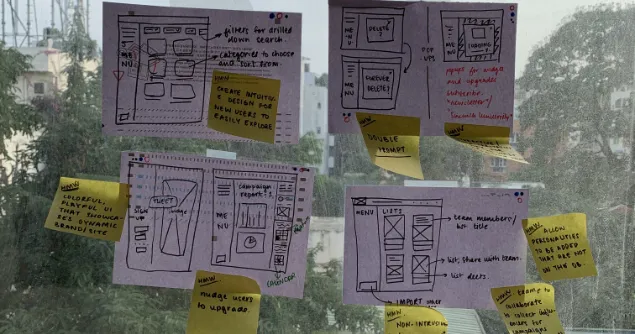 Crazy 8’s sketches stuck on a window